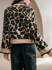 Back view of a Leopard Print Bow-Tie Front Cropped Cardigan with lace-up detail, perfect for layered styling.