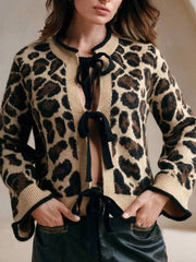 Leopard Print Bow-Tie Front Cropped Cardigan with lace-up detail, perfect for layering, shown on model.