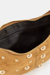 Interior view of the Fame Dome Studded Chrome Crescent Hand Bag with gold studs and black lining