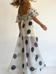 Polka Dot Ruffle Crop Top and Maxi Skirt Set with off-shoulder design, featuring a chic and elegant summer outfit with bold polka dots.