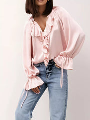 Woman wearing Ruffle Trim Satin Flounce Sleeve Blouse with jeans for a chic look