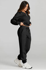 Women's Quarter Zip Top and Drawstring Pants Active Set in black, stylish and comfortable for casual wear and light activity.