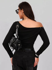 Back view of a woman wearing a Studded One Shoulder Long Sleeve T-Shirt in black with a slightly stretchy fit and a stylish bag.