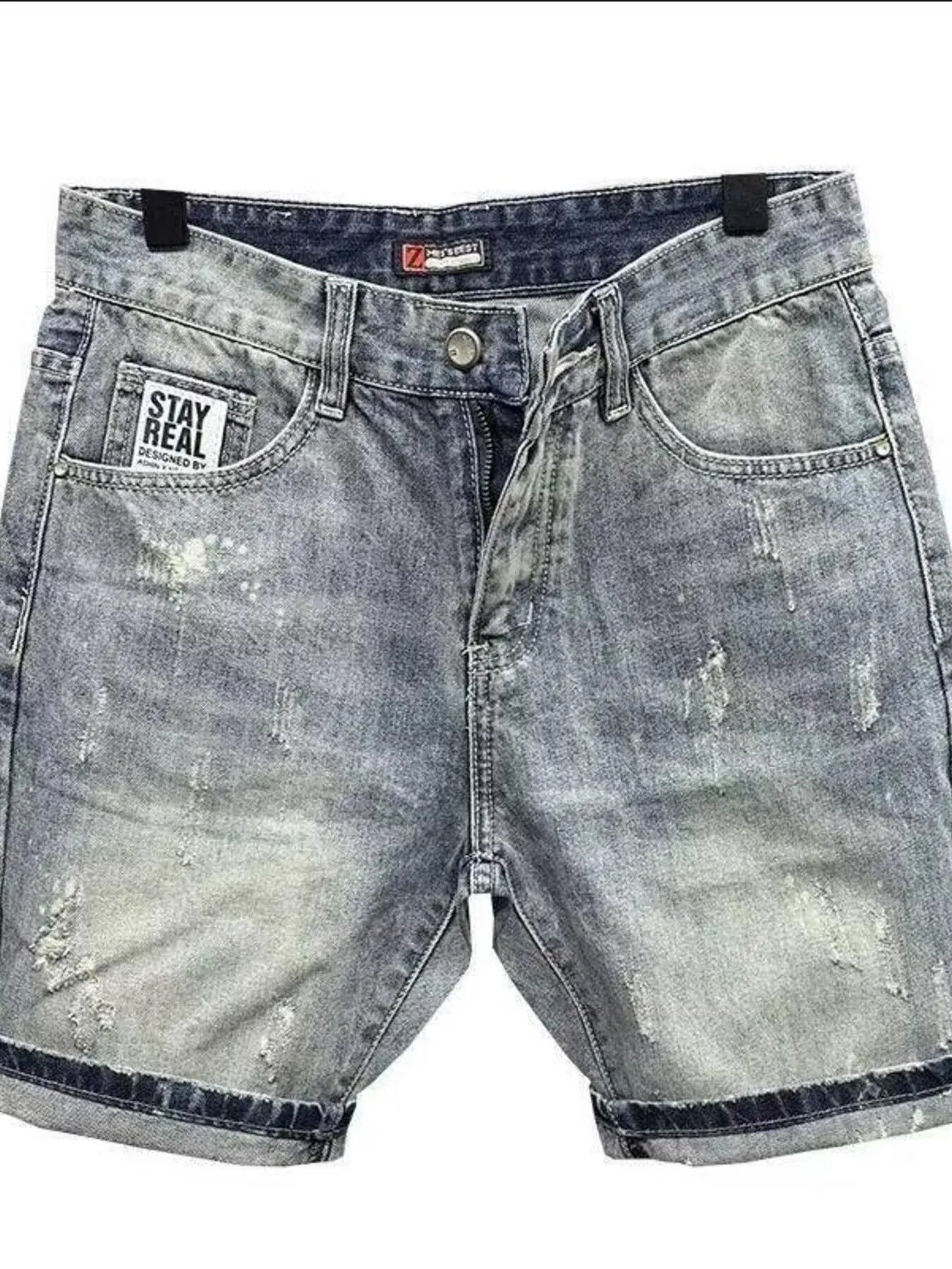 Men's pocketed denim shorts in light washed blue with button and zipper closure. Stylish and slightly stretchy fabric.