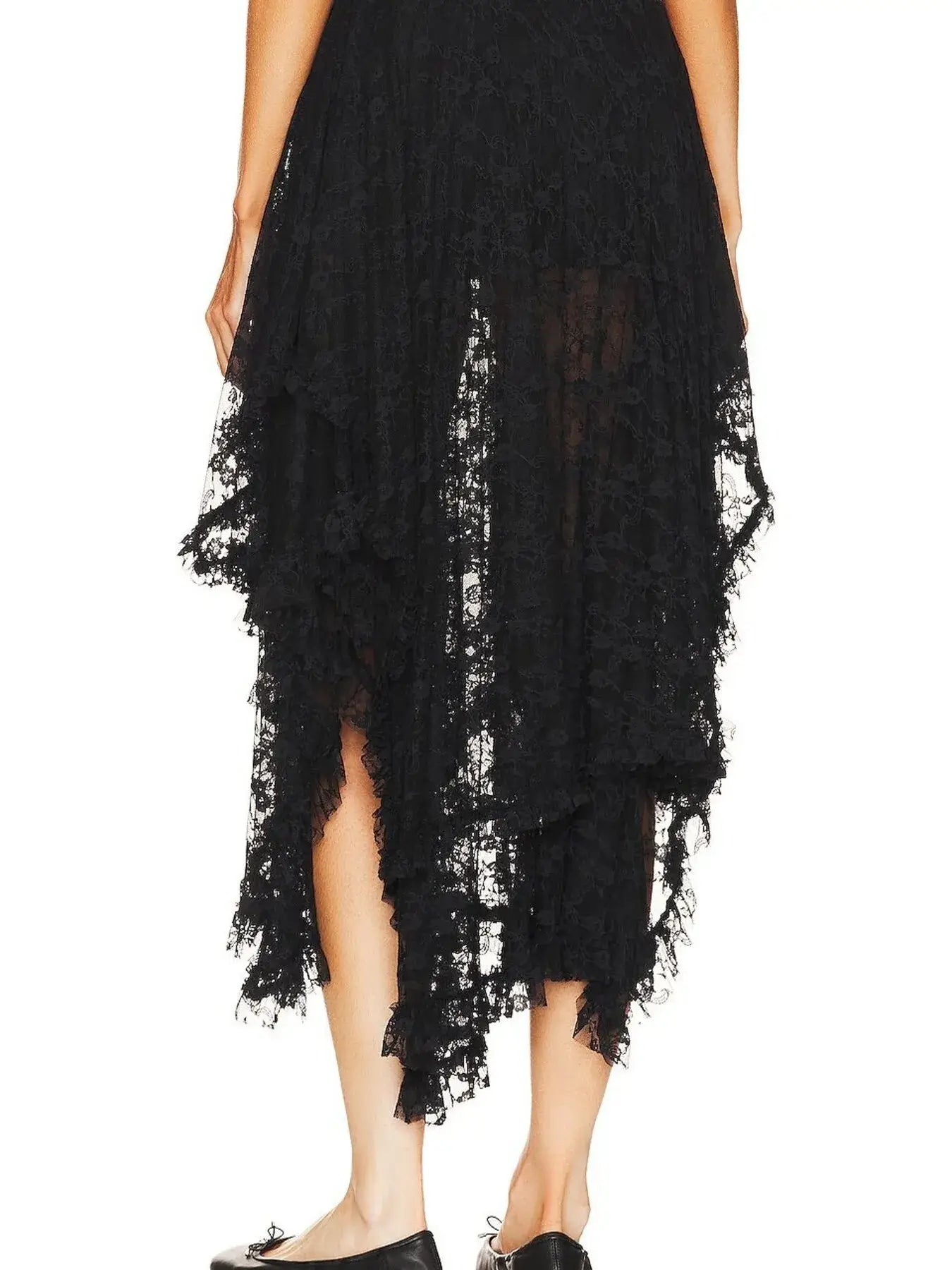 Back view of black asymmetrical lace midi skirt with sheer detailing, showcasing a modern and chic silhouette.