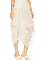 Asymmetrical lace midi skirt with sheer detailing, featuring a modern silhouette and elegant design, perfect for evening wear.