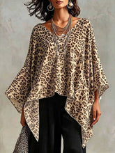 Asymmetrical Leopard Print Top Plus Size in yellow with a stylish design, featuring a slightly stretchy material.