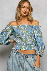 POL Floral Print Smocked Off-Shoulder Blouse with floral design and puffed sleeves, perfect for warm-weather styling.