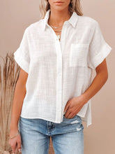 Cotton Button Up Short Sleeve Shirt worn by a woman, featuring a white fabric and a casual style.