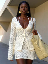 Model wearing a Button Up Crochet Cardigan and Skirt Sweater Set, showcasing an elegant openwork design.