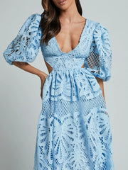 Elegant cutout back lace crochet V-neck dress with intricate detailing and feminine silhouette.