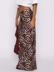 Chic Leopard Maxi Skirt with bold print, perfect for stylish outfits; model wearing skirt paired with white top.
