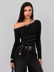 Woman wearing a Studded One Shoulder Long Sleeve T-Shirt with black jeans, showcasing studded design and unique fit.