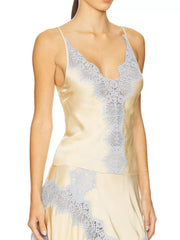 Model wearing Lace Detail Cami and Skirt Set featuring intricate lace detailing and a soft sheen.