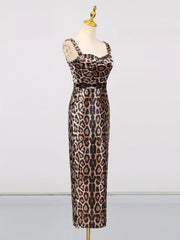 Leopard Print Bodycon Back Slit Midi Dress displayed on a mannequin showcasing its leopard print and back slit design.