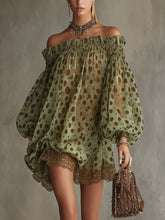 Polka Dot Sheer Mini Dress featuring sheer fabric and puff sleeves in a green color.
