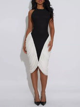 Two-Tone Sleeveless Ruched Midi Dress featuring a sleek black and white design with ruched detailing.