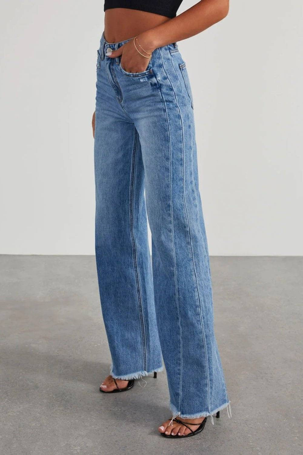 Women’s Raw Hem Wide Leg Jeans with Pockets.