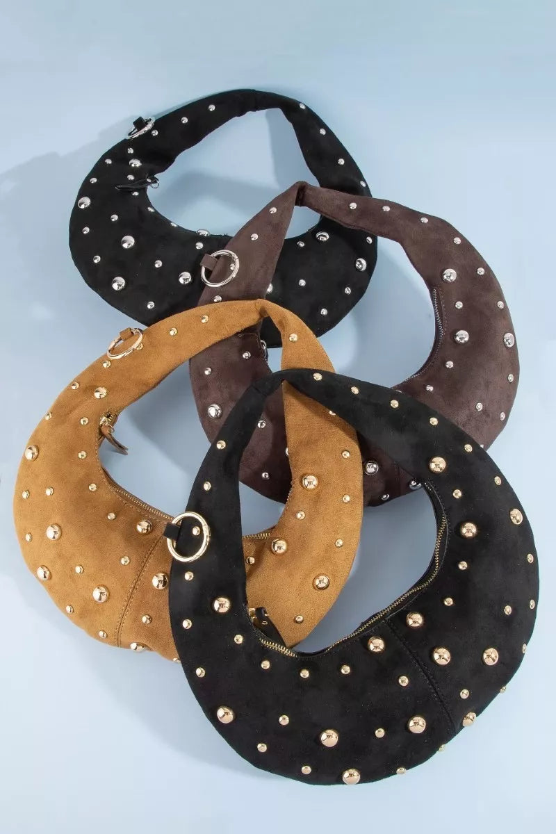 Four Fame Dome Studded Chrome Crescent Hand Bags in black, brown, and tan, featuring unique crescent shapes with chrome studs.