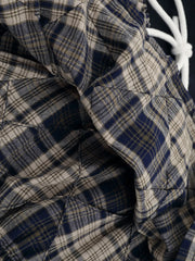 Close-up of ruched Drawstring Plaid Skort fabric texture and drawstring detail
