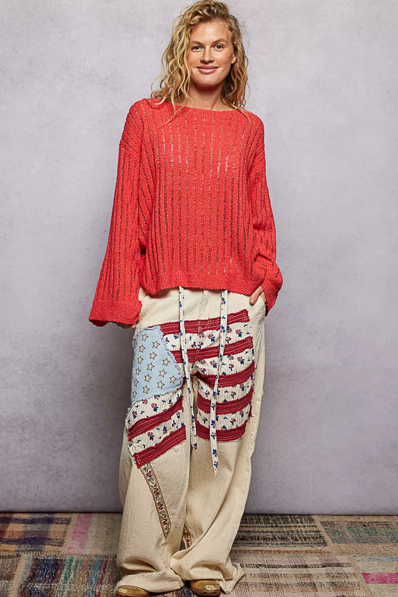 POL Round Neck Long Sleeve Open Weave Sweater styled with relaxed fit pants, featuring a cozy open weave design.