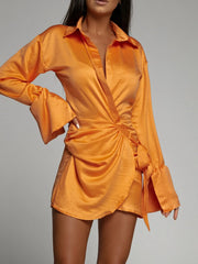 Chic Side Tie Long Sleeve Shirt Dress in orange, showcasing structured design and cuffed sleeves for a stylish look.