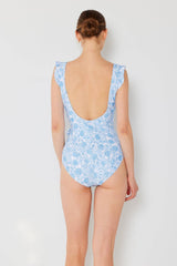Back view of Marina West Swim Full Size Float Ruffle Faux Wrap One-Piece Swimsuit featuring low scoop back and ruffled shoulder straps.