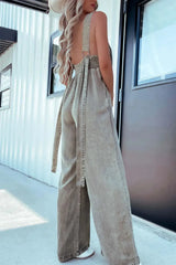 Side-back view of khaki V-Neck Sleeveless Denim Jumpsuit with adjustable straps and smocked back panel for flexible fit.