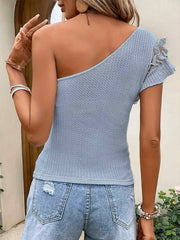 Back view of Elegant Textured Ruffled One Shoulder Top showing fitted silhouette and soft textured fabric, ideal for summer fashion.