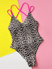 Flat lay of classic Leopard Plunge Swimwear featuring wild leopard print, plunge neckline, and pink adjustable straps.