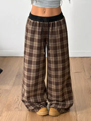 GirlSavvi’s Plaid Wide Leg Pants with adjustable drawstring waist and relaxed fit, perfect for casual or elevated style.