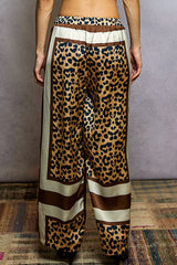 Back view of POL Leopard Printed Woven Wide Leg Drawstring Pants showcasing leopard print and wide leg design.