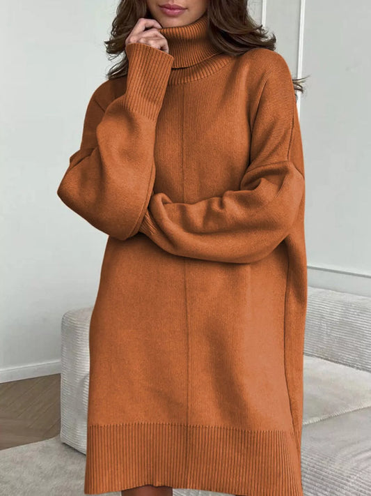 Woman wearing Solid Color Turtleneck Drop Shoulder Loose Sweater Dress in cozy indoor setting, showcasing fall fashion style.