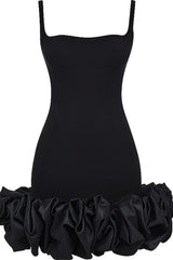 Flat lay of black Ruched Square Neck Sleeve Mini Dress from GirlSavvi, highlighting structured silhouette and ruffled hemline.