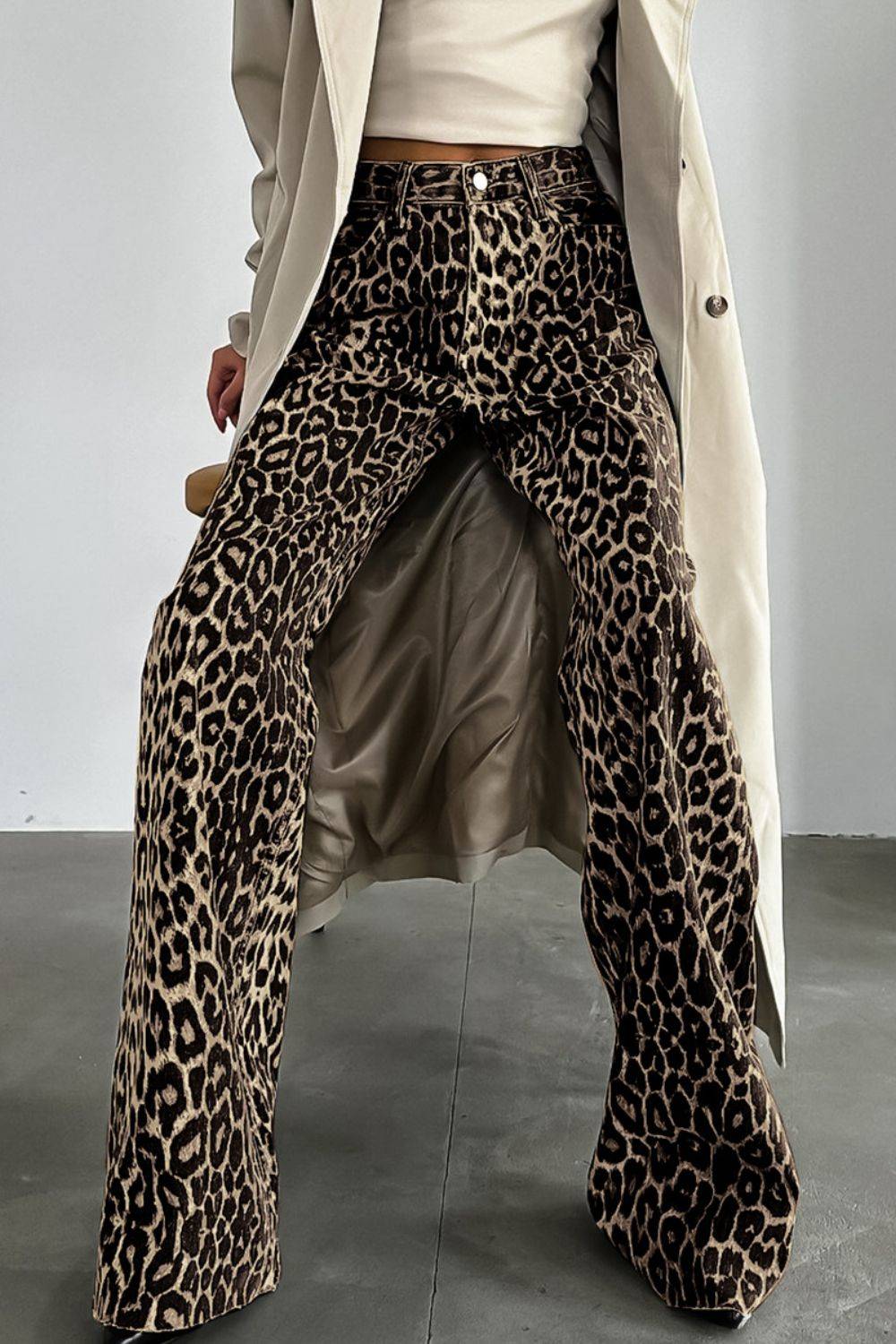 Leopard Wide Leg Pants with Pockets styled with a trench coat, combining bold print with chic outerwear for a fashion-forward look.