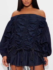 Off-Shoulder Ruched Denim Dress featuring drawstring and ruffled design, perfect for casual outings.