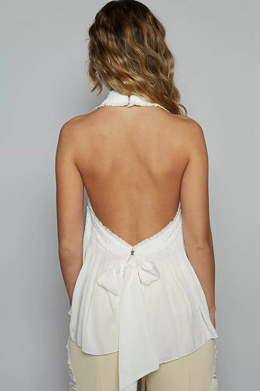 Woman wearing POL Backless Halter Sleeveless Top with Smocking Shirring Detail, showcasing a stylish and elegant backless design.