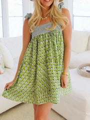 Green floral Printed Square Neck Tie Shoulder Mini Dress styled with striped shoulder ties for a breezy summer chic look.
