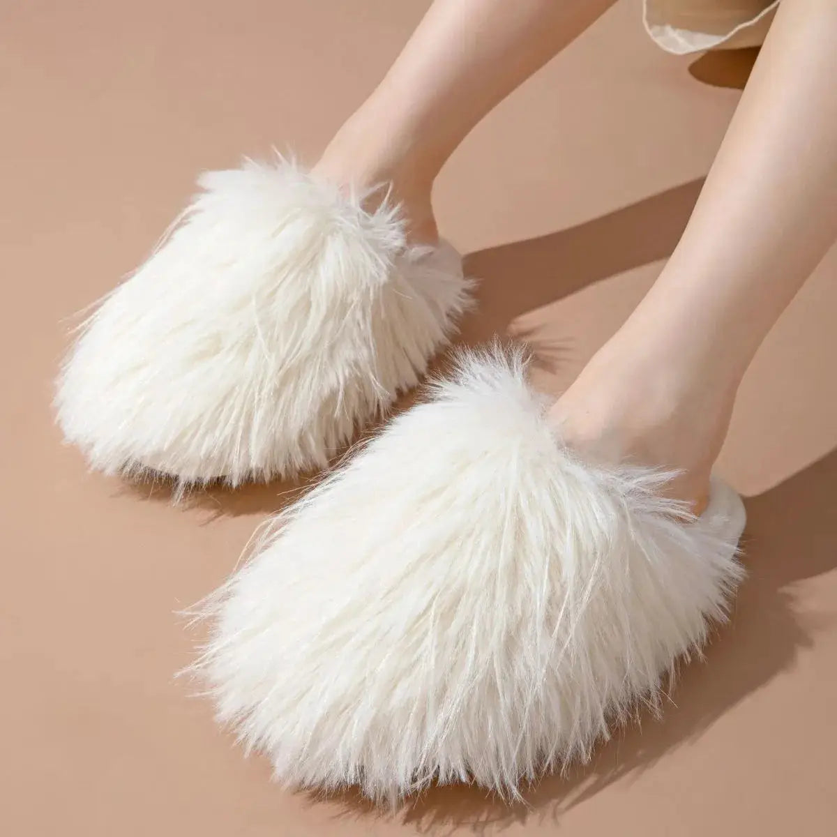 Model wearing white fluffy round toe flats slippers with soft PVC sole, designed for comfort and elegance at home.