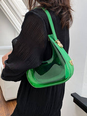Green PU Leather PVC Shoulder Bag worn with black outfit, showcasing its vibrant color and modern silhouette.