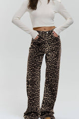 Model wearing Leopard Wide Leg Pants with Pockets styled with a crop top, emphasizing the bold pattern and laid-back comfort.