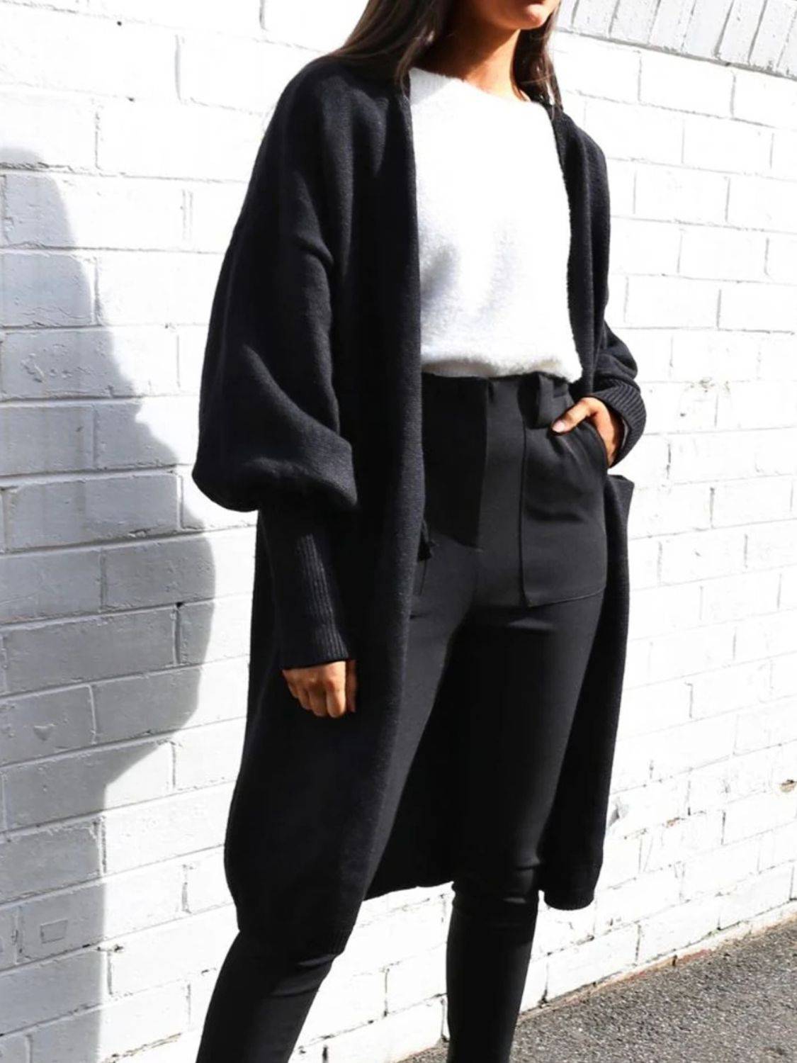 Perfee Open Front Dropped Shoulder Cardigan worn over a white top and black pants, ideal for cozy layering in fall or winter fashion.
