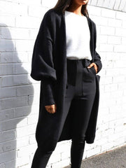 Perfee Open Front Dropped Shoulder Cardigan worn over a white top and black pants, ideal for cozy layering in fall or winter fashion.