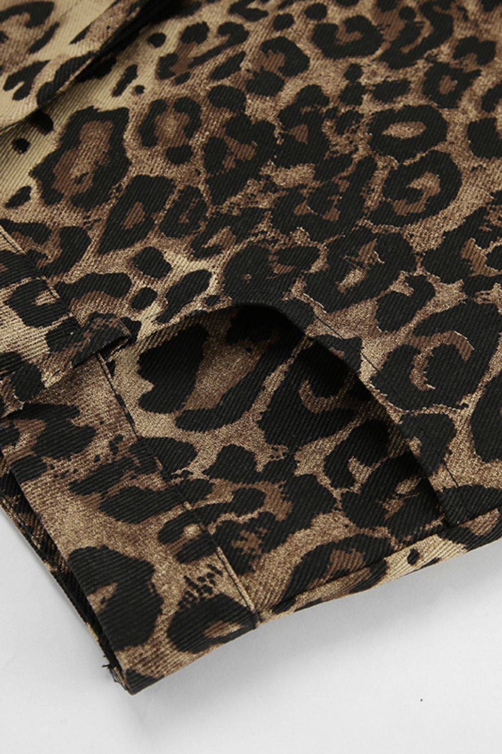 Detailed hem view of Leopard Wide Leg Pants with Pockets showing high-quality stitching and bold leopard print on cotton fabric.