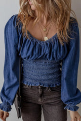 Smocked Long Sleeve Denim Top featuring a gathered neckline and fitted waist, perfect for summer-ready casual outfits.