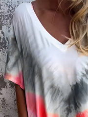 Close-up of coral and gray Tie-Dye Pocketed Dress neckline. V-neck design with soft, breathable stretch fabric.