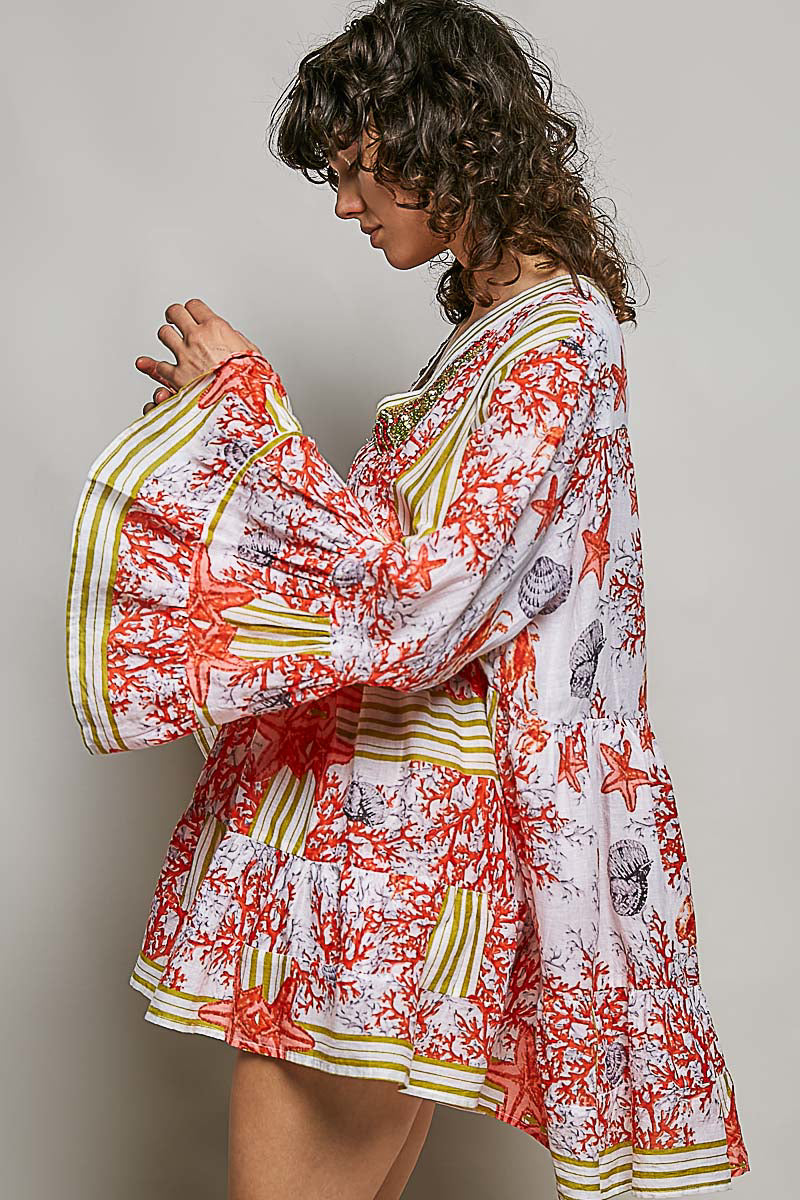 POL Striped Floral Long Sleeve Mini Dress with Pintuck Detail showcased on model, highlighting V-neckline and ruffle cuffs.