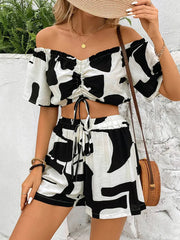 Perfee Drawstring Off-Shoulder Top and Shorts Set Sets GirlSavvi featuring stylish ruched detailing and casual summer vibe.