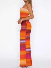 Woman modeling a Striped Tube Top and Skirt Set in vibrant colors, featuring a basic style and slightly stretchy polyester fabric.