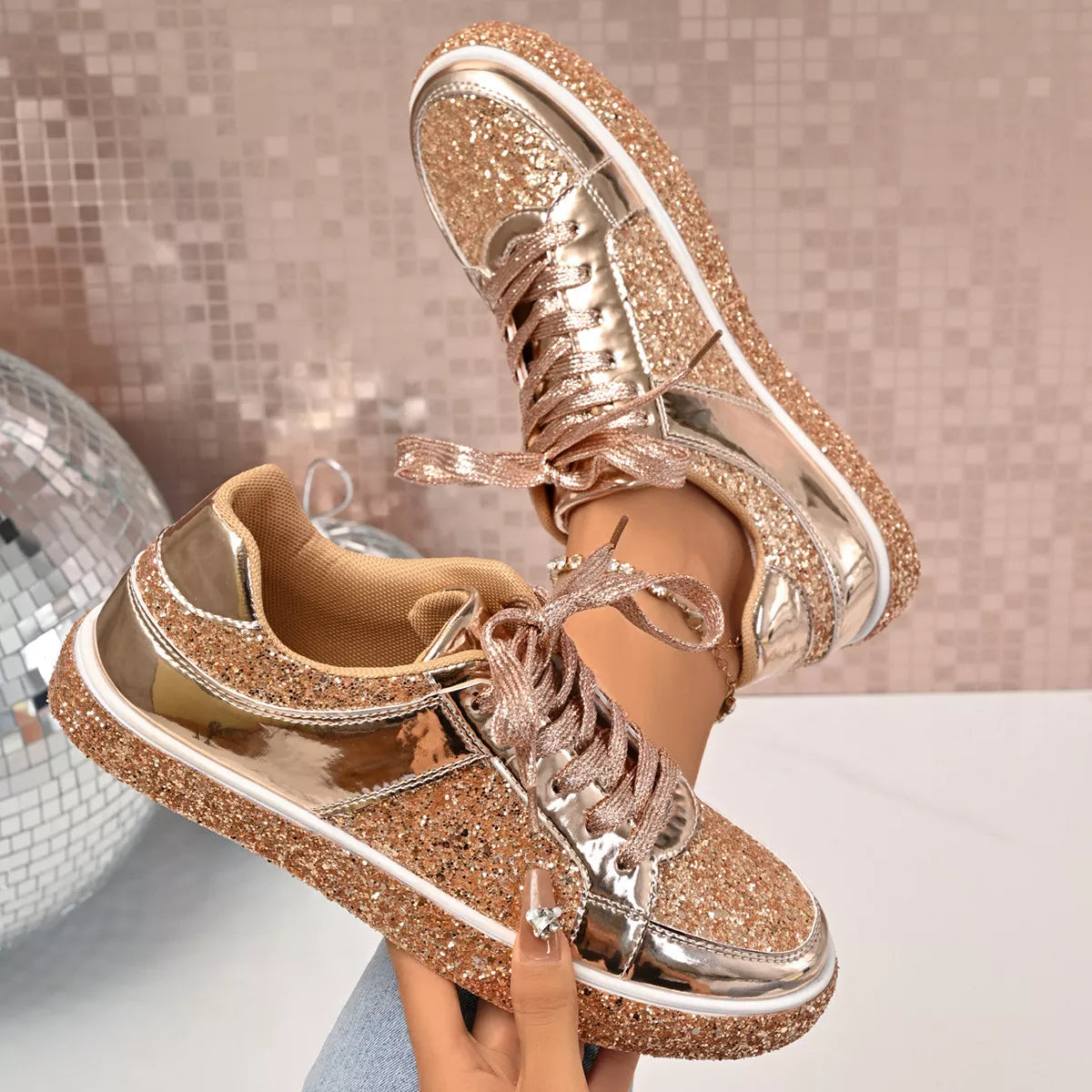 Rose gold Sequin Lace Up Sneakers with glittery design, made of sequins and PU leather. Stylish flats perfect for trendy casual wear.